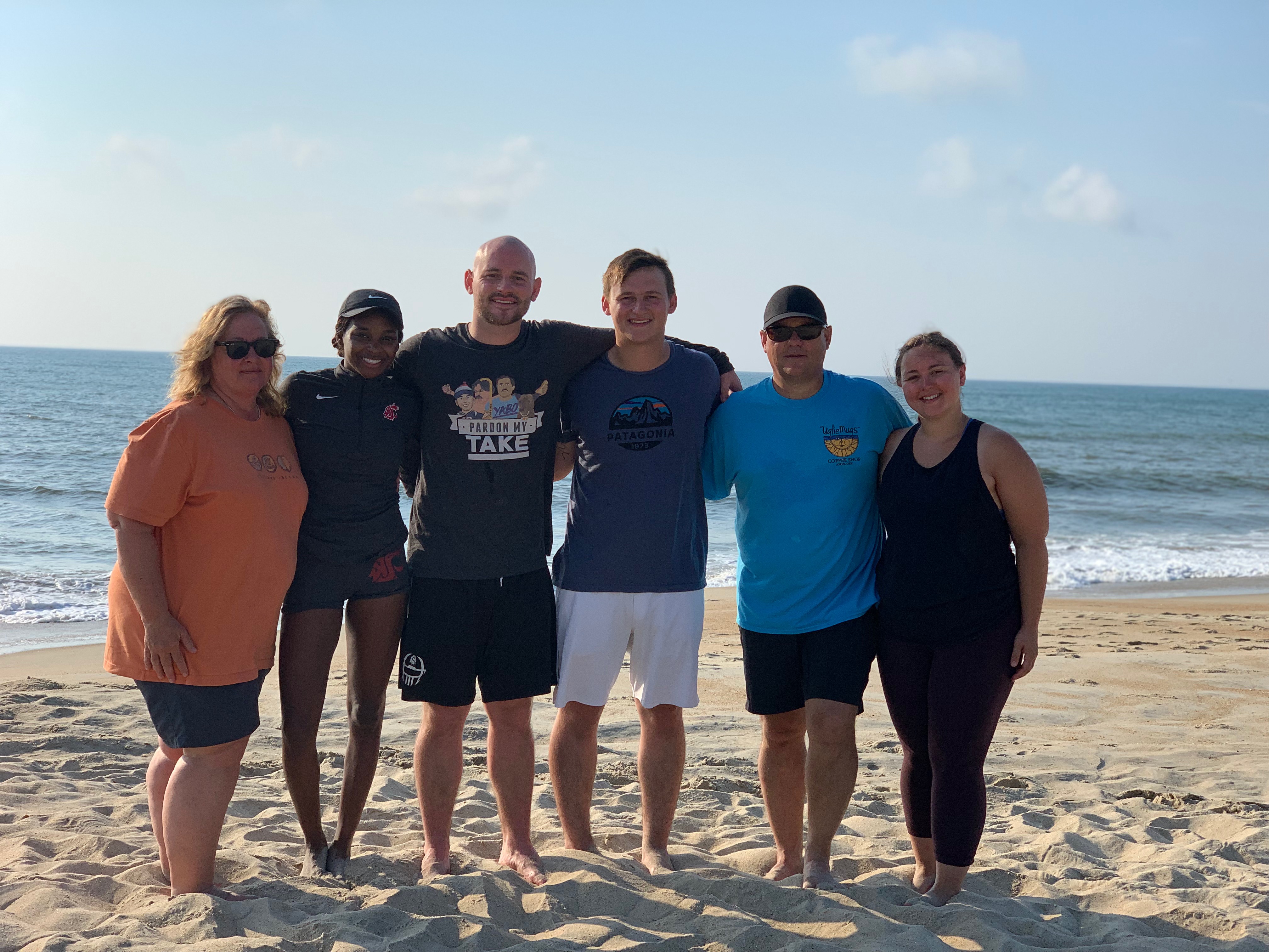 Beach yoga session in Avon with Hatteras Yoga