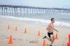 Race Winner, Andrew Nowak, crosses the finish line of the 2016 Memorial Day Shore Break 5K Sponsored by Midgett Realty