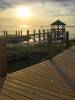 A beautiful sunset in Hatteras Village behind Teach's Lair Marina