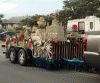 The Midgett Realty float rounds the bend