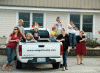 Some of the Midgett Realty crew watches the parade from the Hatteras office
