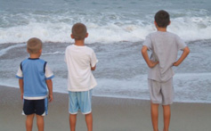 Kids enjoying time on the beach at Hatteras Island